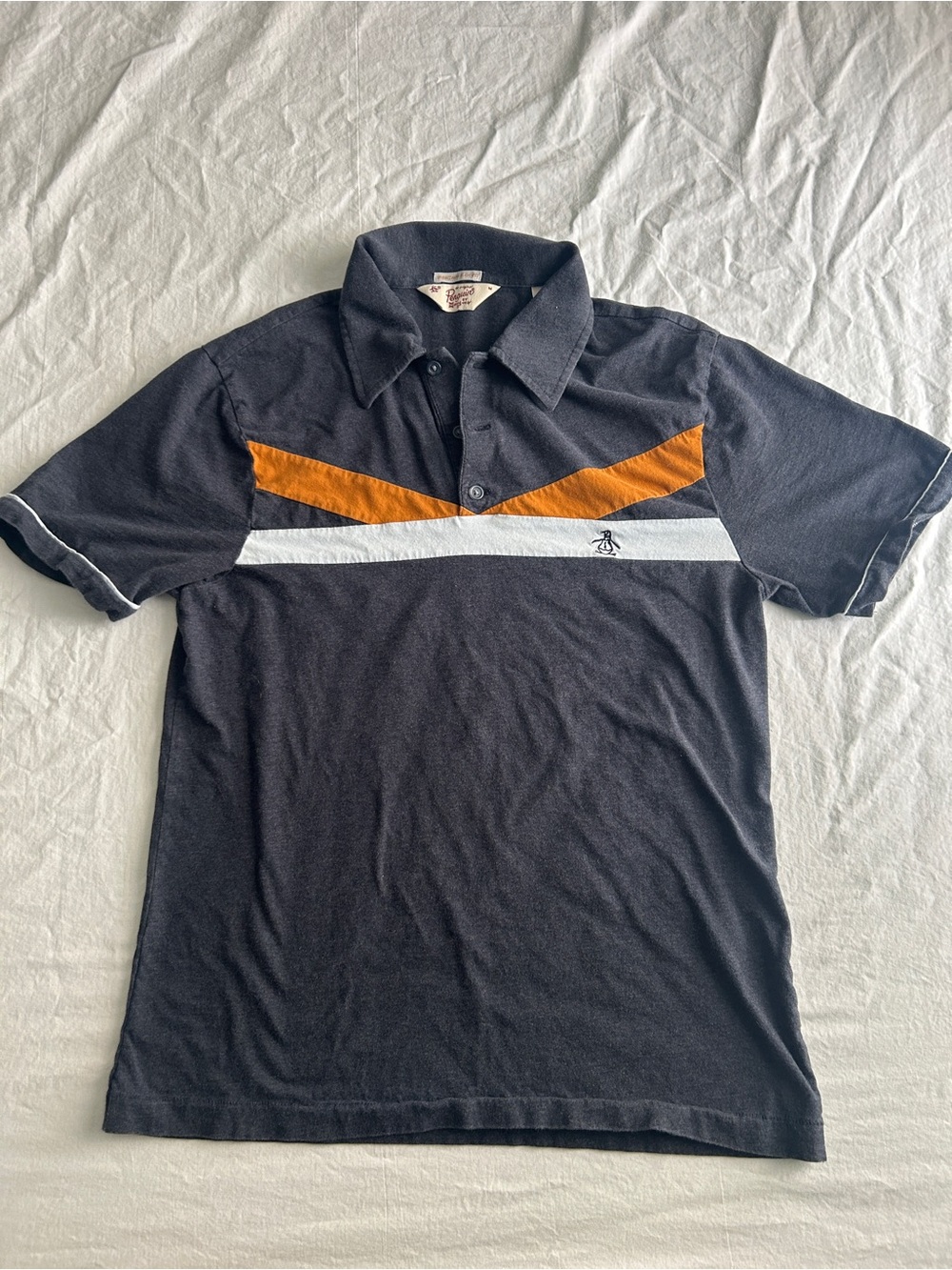 Original Penguin Black Polo with Orange Chevron and White Stripe